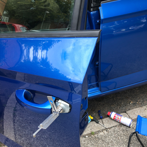 Automotive locksmith Glendale CA technician unlocking a car door