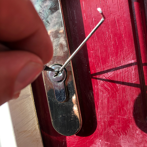 Professional locksmith working on door lock in Glendale CA – trusted locksmith Glendale CA services
